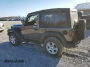 ✅ 2023 Jeep Wrangler Sport S • VIN: 1C4GJXAN8PW637739 • Лот: 48423355. Опубликован ранее на Copart с пробегом 34 026 миль. Бесплатный доступ к архиву аукционных продаж из США и подробный отчёт об истории автомобиля на DreamBid. Изображение 2.