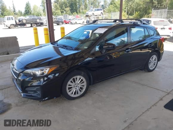 ✅ 2017 Subaru Impreza Premium • VIN: 4S3GTAB64H3740061 • Lot: 43033499. Listed on IAAI with 115,173 mi. Free auction sales archive from the USA and detailed vehicle history report at DreamBid. Image 17.