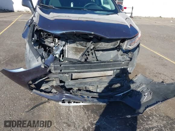 2019 Chevrolet Trax LS with VIN 3GNCJNSB3KL198902, listed as a IAAI auction lot 43458258 with 73,972 mi miles and . Bid and sale history available at DreamBid. Image 6.