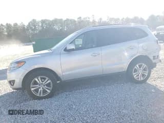 ✅ 2012 Hyundai Santa Fe SE • VIN: 5XYZHDAG2CG145428 • Lot: 81672604. Listed on Copart with 89,987 mi. Free auction sales archive from the USA and detailed vehicle history report at DreamBid. Image 1.