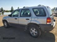 ✅ 2003 Ford Escape XLS Popular • VIN: 1FMYU021X3KE12587 • Lot: 68834055. Listed on Copart with 203,996 mi. Free auction sales archive from the USA and detailed vehicle history report at DreamBid. Image 2.