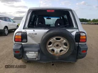 ✅ 1998 Toyota RAV4 • VIN: JT3HP10V5W0189631 • Лот: 68069744. Опубликован ранее на Copart с пробегом 321 523 миль. Бесплатный доступ к архиву аукционных продаж из США и подробный отчёт об истории автомобиля на DreamBid. Изображение 6.