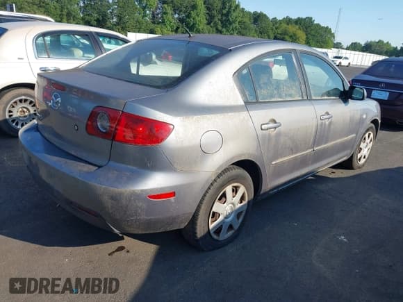 ✅ 2006 Mazda 3 i • VIN: JM1BK12G461466004 • Lot: 42515391. Listed on IAAI with 170,745 mi. Free auction sales archive from the USA and detailed vehicle history report at DreamBid. Image 4.