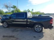 ✅ 2021 Ram 1500 Longhorn • VIN: 1C6SRFST3MN657898 • Lot: 43647983. Listed on IAAI with 206,104 mi. Free auction sales archive from the USA and detailed vehicle history report at DreamBid. Image 15.