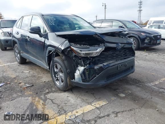 ✅ 2022 Toyota RAV4 Hybrid XLE • VIN: JTMRWRFV4ND154210 • Лот: 43585060. Опубликован ранее на IAAI с пробегом 63 880 миль. Бесплатный доступ к архиву аукционных продаж из США и подробный отчёт об истории автомобиля на DreamBid. Изображение 1.