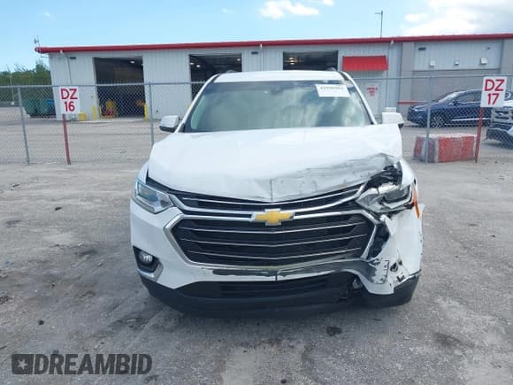 ✅ 2021 Chevrolet Traverse LT Cloth • VIN: 1GNERGKW0MJ126548 • Lot: 42998904. Wystawiony na IAAI z przebiegiem 66 776 mil. Bezpłatny archiwum sprzedaży aukcyjnych z USA i szczegółowy raport historii pojazdu na DreamBid. Zdjęcie 12.