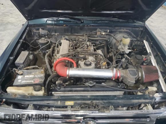 ✅ 1994 Toyota Pickup DLX • VIN: 4TARN81P4RZ190098 • Лот: 81152845. Опубликован ранее на Copart с пробегом 112 553 миль. Бесплатный доступ к архиву аукционных продаж из США и подробный отчёт об истории автомобиля на DreamBid. Изображение 11.