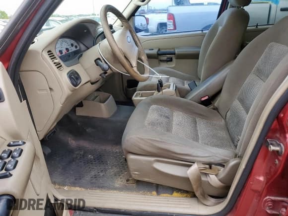 ✅ 2004 Ford Explorer Sport Trac XLS • VIN: 1FMZU67K74UA46795 • Lot: 51621905. Listed on Copart with Not provided. Free auction sales archive from the USA and detailed vehicle history report at DreamBid. Image 7.
