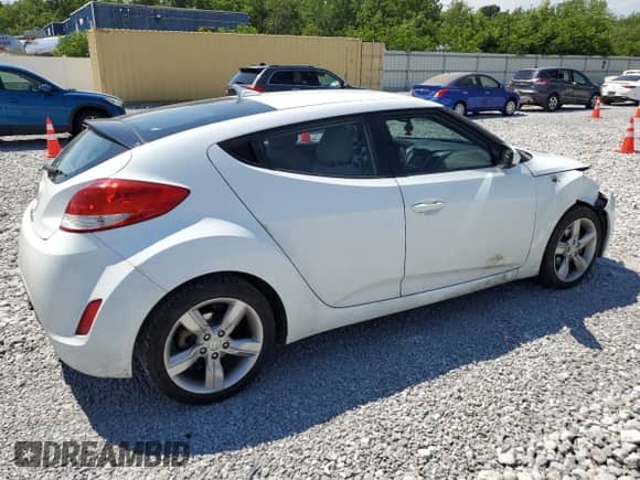 2013 Hyundai Veloster w/Gray Int с VIN KMHTC6AD8DU132894, выставлен на аукционе Copart как лот 58910604 с пробегом 128 753 миль миль и Списание • Salvage title. История ставок и продаж доступна на DreamBid. Изображение 3.