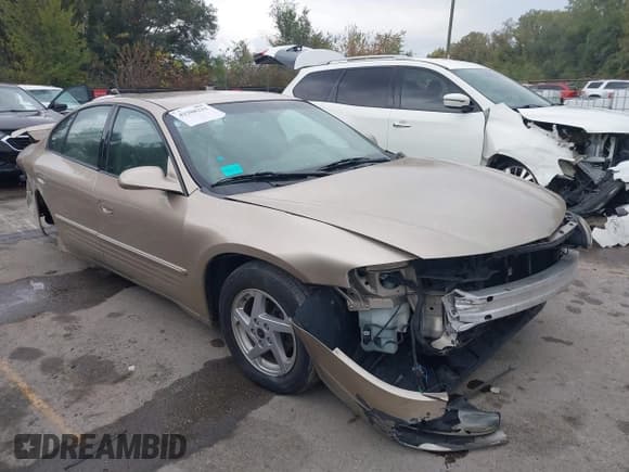 ✅ 2005 Pontiac Bonneville SE • VIN: 1G2HX52K15U189935 • Lot: 43388221. Listed on IAAI with 136,509 mi. Free auction sales archive from the USA and detailed vehicle history report at DreamBid. Image 1.