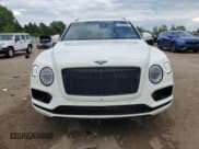 ✅ 2018 Bentley Bentayga Signature • VIN: SJAAC2ZV2JC017454 • Лот: 58329085. Опубликован ранее на Copart с пробегом 76 318 миль. Бесплатный доступ к архиву аукционных продаж из США и подробный отчёт об истории автомобиля на DreamBid. Изображение 5.