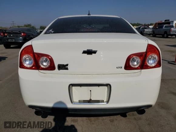 ✅ 2008 Chevrolet Malibu LTZ • VIN: 1G1ZK57738F280337 • Lot: 70522424. Listed on Copart with 194,476 mi. Free auction sales archive from the USA and detailed vehicle history report at DreamBid. Image 6.