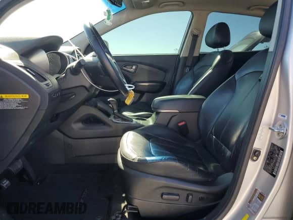 2014 Hyundai Tucson SE z VIN KM8JUCAG7EU843064, wystawiony jako Copart lot #71027575 z przebiegiem 178 099 mil mil oraz Szkoda całkowita • Salvage title. Historia ofert i sprzedaży dostępna na DreamBid. Obrazek 7.