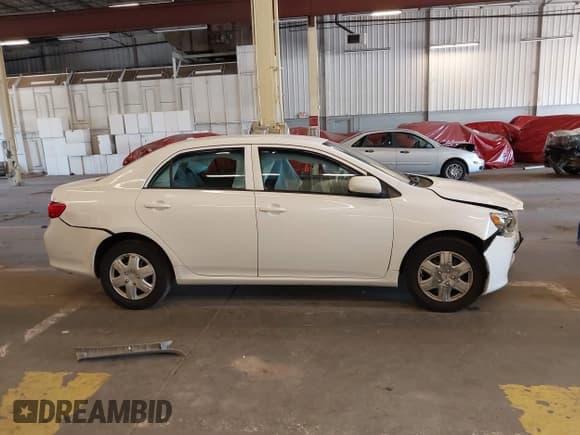 ✅ 2010 Toyota Corolla • VIN: 1NXBU4EE5AZ284210 • Lot: 42334607. Listed on IAAI with 105,246 mi. Free auction sales archive from the USA and detailed vehicle history report at DreamBid. Image 13.