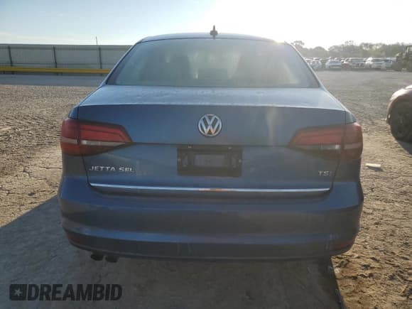 ✅ 2017 Volkswagen Jetta SEL • VIN: 3VWL17AJ2HM203228 • Lot: 81230695. Listed on Copart with 54,631 mi. Free auction sales archive from the USA and detailed vehicle history report at DreamBid. Image 6.