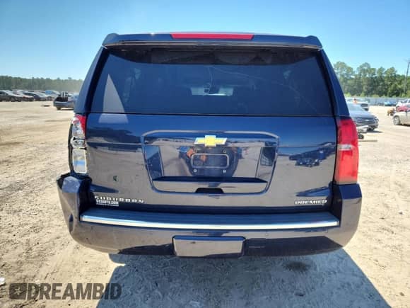 2019 Chevrolet Suburban Premier with VIN 1GNSCJKCXKR110511, listed as a Copart auction lot 71028945 with 87,669 mi miles and Salvage title. Bid and sale history available at DreamBid. Image 6.