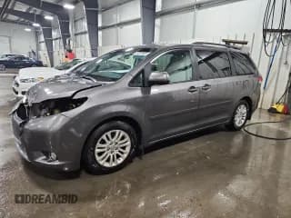 ✅ 2014 Toyota Sienna XLE • VIN: 5TDYK3DC2ES471560 • Lot: 93235465. Listed on Copart with 164,518 mi. Free auction sales archive from the USA and detailed vehicle history report at DreamBid. Image 1.
