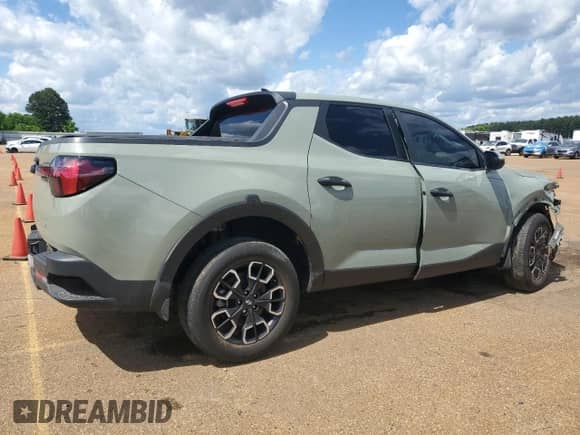 2023 Hyundai Santa Cruz SE with VIN 5NTJA4AE7PH069415, listed as a Copart auction lot 56434945 with 43,866 mi miles and Salvage title. Bid and sale history available at DreamBid. Image 3.