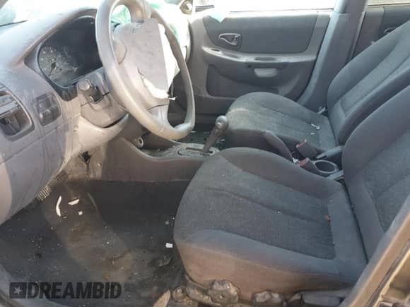 2002 Hyundai Accent GL с VIN KMHCG45C92U305295, выставлен на аукционе Copart как лот 43836105 с пробегом 92 435 миль миль и На запчасти • Non repairable. История ставок и продаж доступна на DreamBid. Изображение 7.