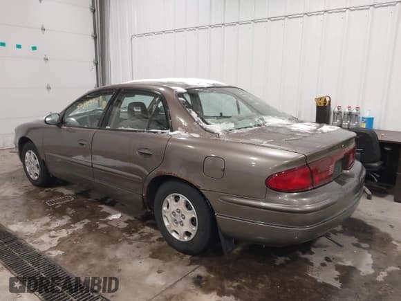 ✅ 2002 Buick Regal LS • VIN: 2G4WB52K521167117 • Lot: 43893969. Listed on IAAI with 138,587 mi. Free auction sales archive from the USA and detailed vehicle history report at DreamBid. Image 6.