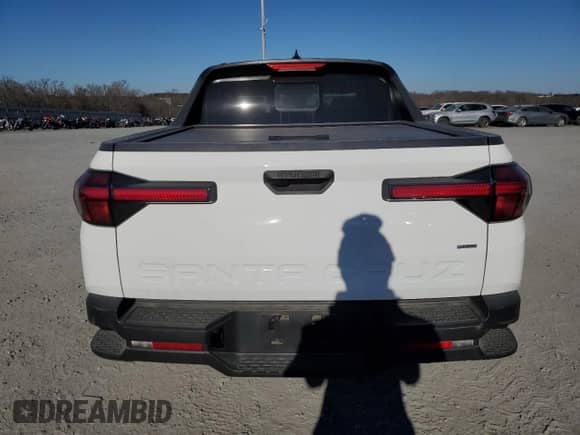 2023 Hyundai Santa Cruz SEL с VIN 5NTJCDAE5PH050193, выставлен на аукционе Copart как лот 88003415 с пробегом 14 862 миль миль и Списание • Salvage title. История ставок и продаж доступна на DreamBid. Изображение 6.