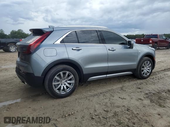 ✅ 2023 Cadillac XT4 AWD Premium Luxury • VIN: 1GYFZDR48PF175997 • Лот: 85144605. Опубликован ранее на Copart с пробегом 51 915 миль. Бесплатный доступ к архиву аукционных продаж из США и подробный отчёт об истории автомобиля на DreamBid. Изображение 3.