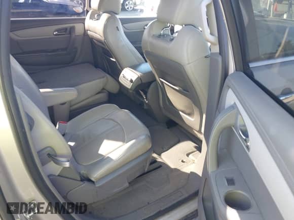 2014 Chevrolet Traverse LT z VIN 1GNKRHKD5EJ134069, wystawiony jako IAAI lot #43489428 z przebiegiem 151 134 mil mil oraz . Historia ofert i sprzedaży dostępna na DreamBid. Obrazek 8.