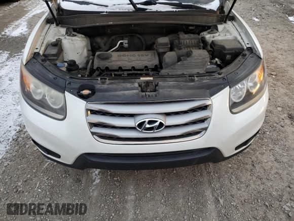 ✅ 2012 Hyundai Santa Fe GLS • VIN: 5XYZGDAB8CG118659 • Lot: 83682914. Listed on Copart with 174,014 mi. Free auction sales archive from the USA and detailed vehicle history report at DreamBid. Image 12.