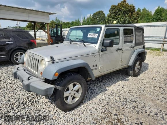 ✅ 2007 Jeep Wrangler X • VIN: 1J4GA391X7L181586 • Lot: 65742995. Listed on Copart with 210,938 mi. Free auction sales archive from the USA and detailed vehicle history report at DreamBid. Image 1.