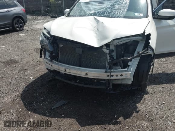 ✅ 2019 Honda Ridgeline RTL-E • VIN: 5FPYK3F71KB017906 • Lot: 42670476. Listed on IAAI with 58,288 mi. Free auction sales archive from the USA and detailed vehicle history report at DreamBid. Image 18.