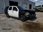 ✅ 2011 Chevrolet Tahoe Commercial • VIN: 1GNLC2E0XBR344000 • Lot: 62489915. Listed on Copart with 114,364 mi. Free auction sales archive from the USA and detailed vehicle history report at DreamBid. Image 13.