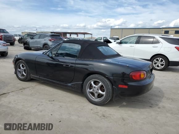 ✅ 2000 Mazda MX-5 Miata • VIN: JM1NB3531Y0140915 • Лот: 56492435. Опубликован ранее на Copart с пробегом 63 371 миль. Бесплатный доступ к архиву аукционных продаж из США и подробный отчёт об истории автомобиля на DreamBid. Изображение 2.