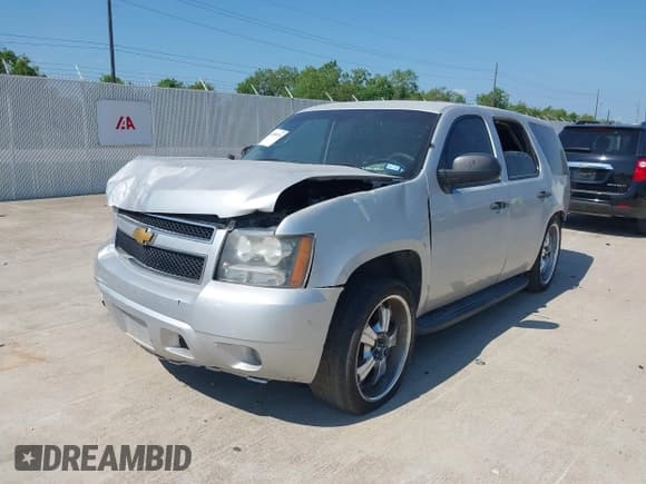 ✅ 2014 Chevrolet Tahoe Commercial • VIN: 1GNLC2E06ER179552 • Lot: 43008501. Listed on IAAI with Not provided. Free auction sales archive from the USA and detailed vehicle history report at DreamBid. Image 2.