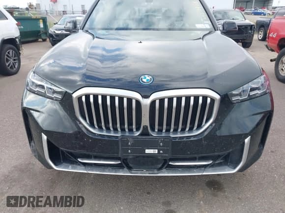 ✅ 2024 BMW X5 xDrive50e • VIN: 5UX43EU01R9T44833 • Lot: 42796422. Wystawiony na IAAI z przebiegiem 27 806 mil. Bezpłatny archiwum sprzedaży aukcyjnych z USA i szczegółowy raport historii pojazdu na DreamBid. Zdjęcie 6.