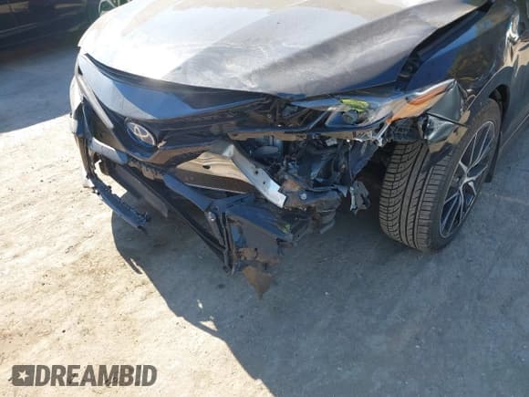 ✅ 2022 Toyota Camry Hybrid SE • VIN: 4T1S31AK2NU594799 • Lot: 43542459. Listed on IAAI with 79,867 mi. Free auction sales archive from the USA and detailed vehicle history report at DreamBid. Image 6.