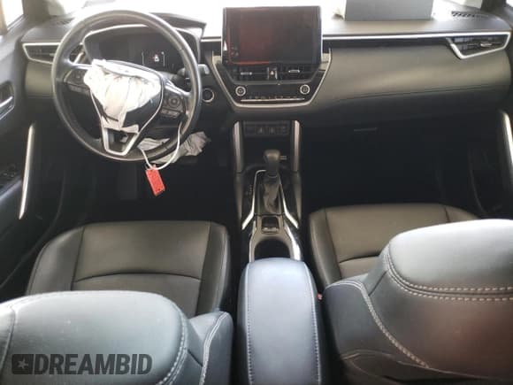✅ 2023 Toyota Corolla Cross XLE • VIN: 7MUDAABG6PV048792 • Lot: 56819095. Listed on Copart with 59,189 mi. Free auction sales archive from the USA and detailed vehicle history report at DreamBid. Image 8.