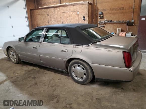 ✅ 2000 Cadillac DeVille DHS • VIN: 1G6KE57Y2YU193102 • Lot: 55532594. Listed on Copart with 132,197 mi. Free auction sales archive from the USA and detailed vehicle history report at DreamBid. Image 2.