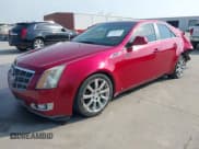 ✅ 2009 Cadillac CTS RWD • VIN: 1G6DV57V390173111 • Lot: 42269117. Listed on IAAI with 165,666 mi. Free auction sales archive from the USA and detailed vehicle history report at DreamBid. Image 2.