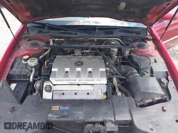 ✅ 2001 Cadillac Eldorado ESC • VIN: 1G6EL12Y31B107932 • Lot: 42723296. Wystawiony na IAAI z przebiegiem 152 482 mil. Bezpłatny archiwum sprzedaży aukcyjnych z USA i szczegółowy raport historii pojazdu na DreamBid. Zdjęcie 10.