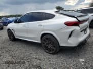 ✅ 2020 BMW X6 M Competition • VIN: 5YMCY0C04L9B05670 • Lot: 64015475. Listed on Copart with 65,235 mi. Free auction sales archive from the USA and detailed vehicle history report at DreamBid. Image 2.