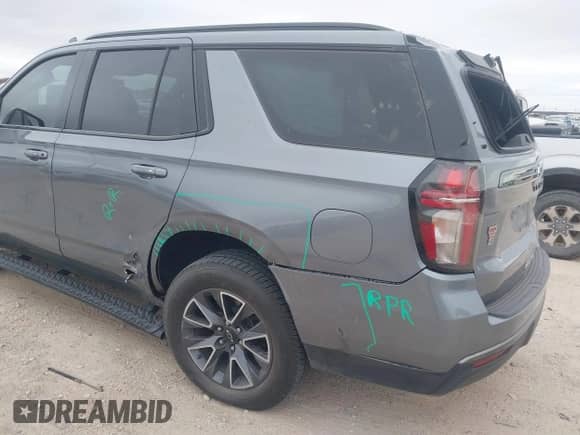 2022 Chevrolet Tahoe Z71 z VIN 1GNSKPKD3NR304672, wystawiony jako IAAI lot #41316391 z przebiegiem 70 380 mil mil oraz . Historia ofert i sprzedaży dostępna na DreamBid. Obrazek 6.