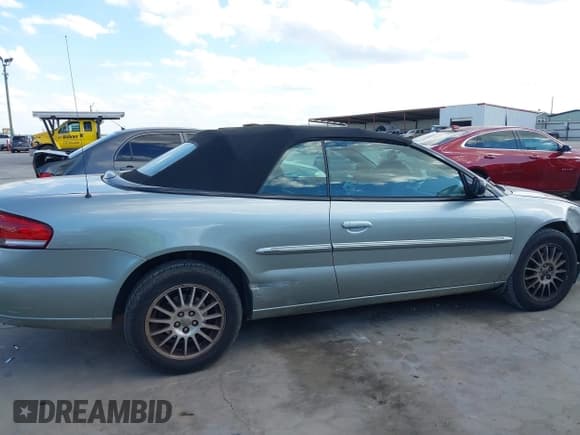 ✅ 2005 Chrysler Sebring Touring • VIN: 1C3EL55R15N684945 • Lot: 43311597. Listed on IAAI with 106,425 mi. Free auction sales archive from the USA and detailed vehicle history report at DreamBid. Image 14.