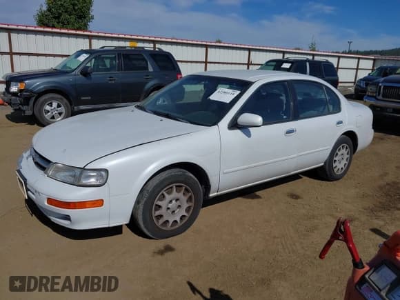 ✅ 1997 Nissan Maxima GXE • VIN: JN1CA21D0VT866104 • Лот: 42580118. Опубликован ранее на IAAI с пробегом 178 255 миль. Бесплатный доступ к архиву аукционных продаж из США и подробный отчёт об истории автомобиля на DreamBid. Изображение 2.