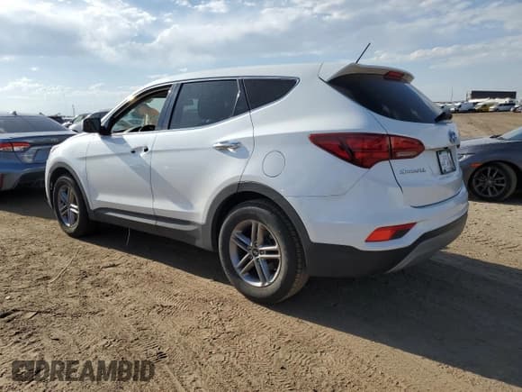 ✅ 2018 Hyundai Santa Fe 2.4L • VIN: 5XYZTDLB0JG553584 • Лот: 59476674. Опубликован ранее на Copart с пробегом 102 438 миль. Бесплатный доступ к архиву аукционных продаж из США и подробный отчёт об истории автомобиля на DreamBid. Изображение 2.
