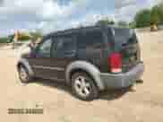 2007 Dodge Nitro SXT with VIN 1D8GT28K87W689785, listed as a Copart auction lot 57440304 with 171,738 mi miles and Salvage title. Bid and sale history available at DreamBid. Image 2.