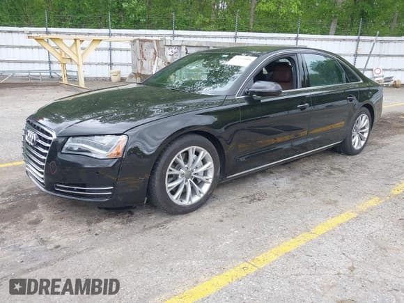 ✅ 2013 Audi A8 3.0L • VIN: WAURGAFD8DN012938 • Lot: 42334901. Listed on IAAI with 64,235 mi. Free auction sales archive from the USA and detailed vehicle history report at DreamBid. Image 2.