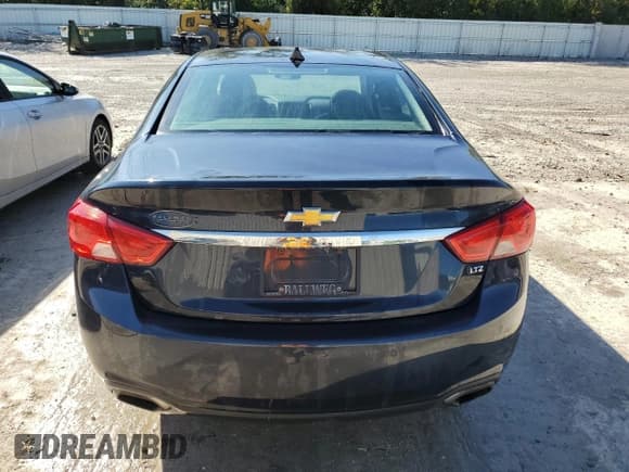 ✅ 2014 Chevrolet Impala LTZ • VIN: 2G1155S3XE9110327 • Лот: 72903924. Опубликован ранее на Copart с пробегом 215 741 миль. Бесплатный доступ к архиву аукционных продаж из США и подробный отчёт об истории автомобиля на DreamBid. Изображение 6.