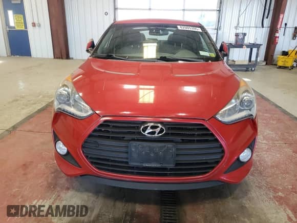 2013 Hyundai Veloster Turbo z VIN KMHTC6AE5DU142985, wystawiony jako Copart lot #82005395 z przebiegiem 122 689 mil mil oraz Czysty tytuł • Clean title. Historia ofert i sprzedaży dostępna na DreamBid. Obrazek 5.