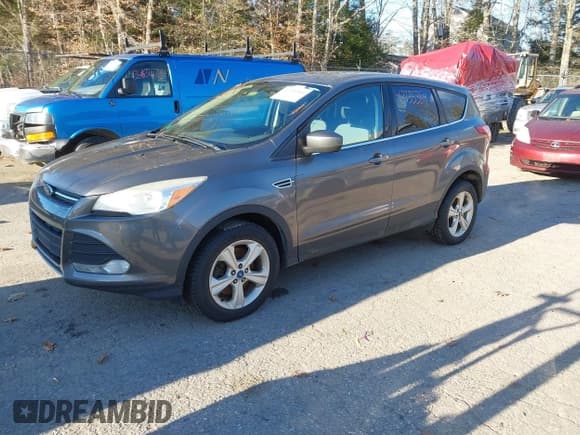 ✅ 2013 Ford Escape SE • VIN: 1FMCU9GX3DUD06452 • Lot: 43735354. Listed on IAAI with 197,951 mi. Free auction sales archive from the USA and detailed vehicle history report at DreamBid. Image 2.