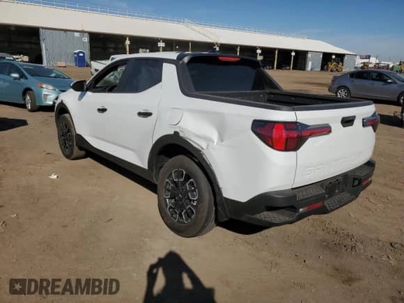 2023 Hyundai Santa Cruz SE с VIN 5NTJA4AE2PH069127, выставлен на аукционе Copart как лот 88811635 с пробегом Не указан миль и Списание • Salvage title. История ставок и продаж доступна на DreamBid. Изображение 2.